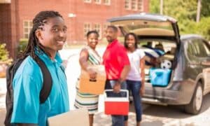 parent dropping off child at college