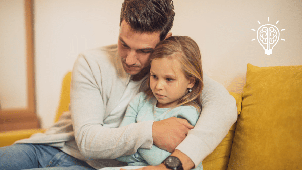 A parent holding their child, representing the child pushing back