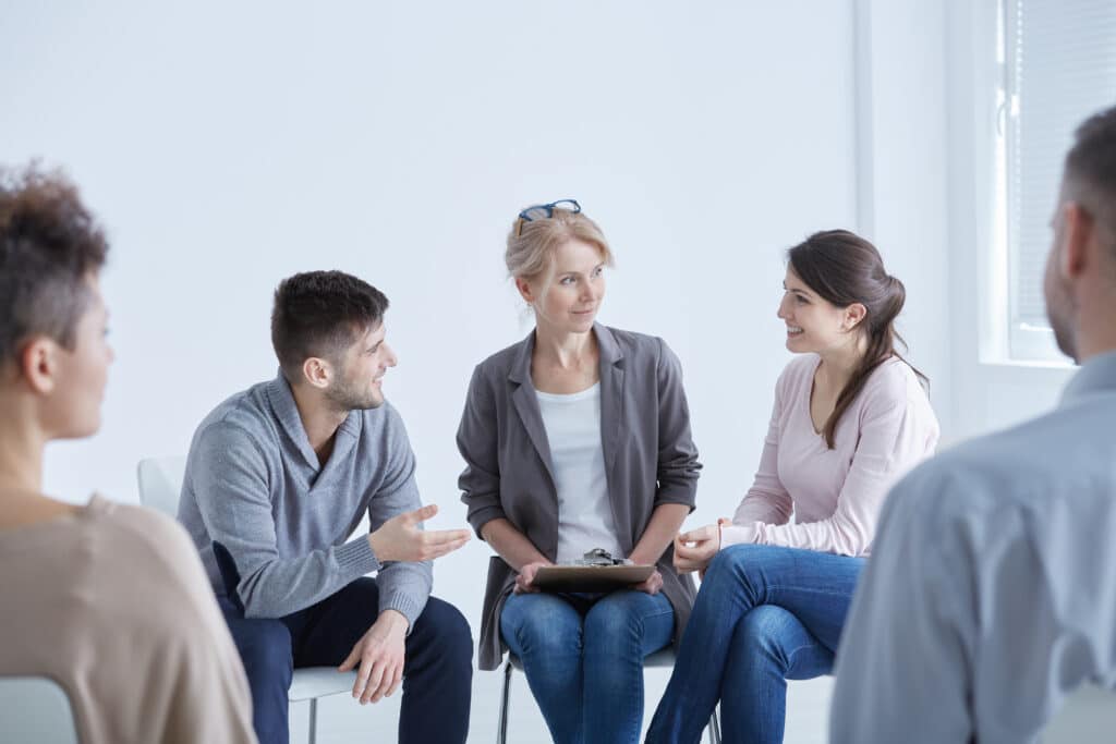 social coach helping his students